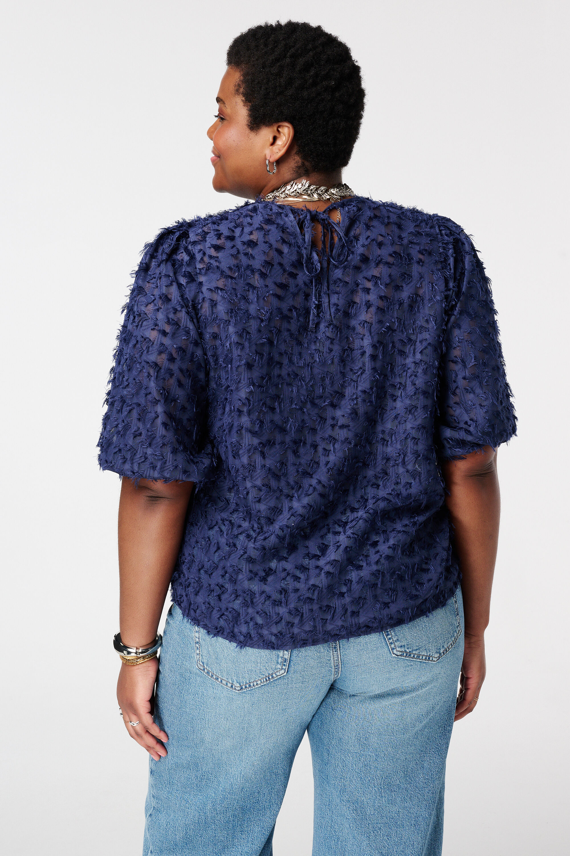 Top met structuur image number 3