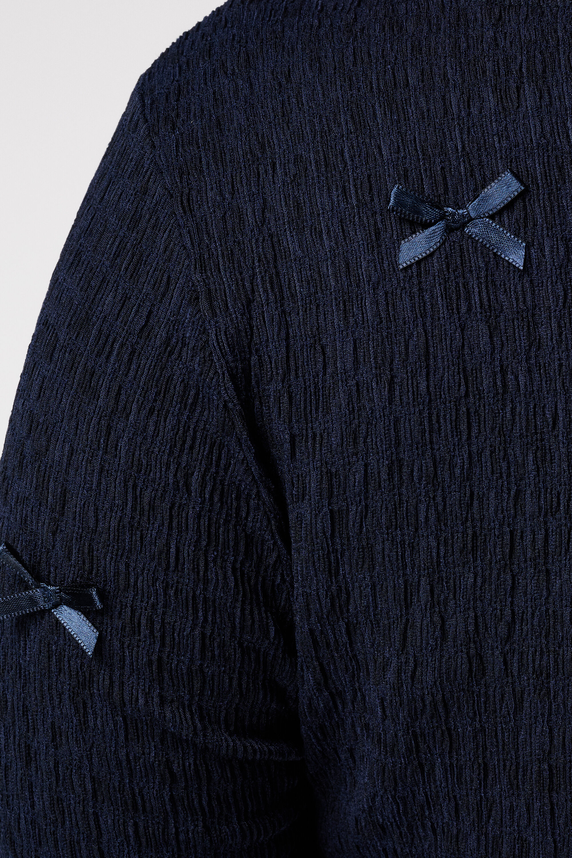 Top met strikdetails image number 6