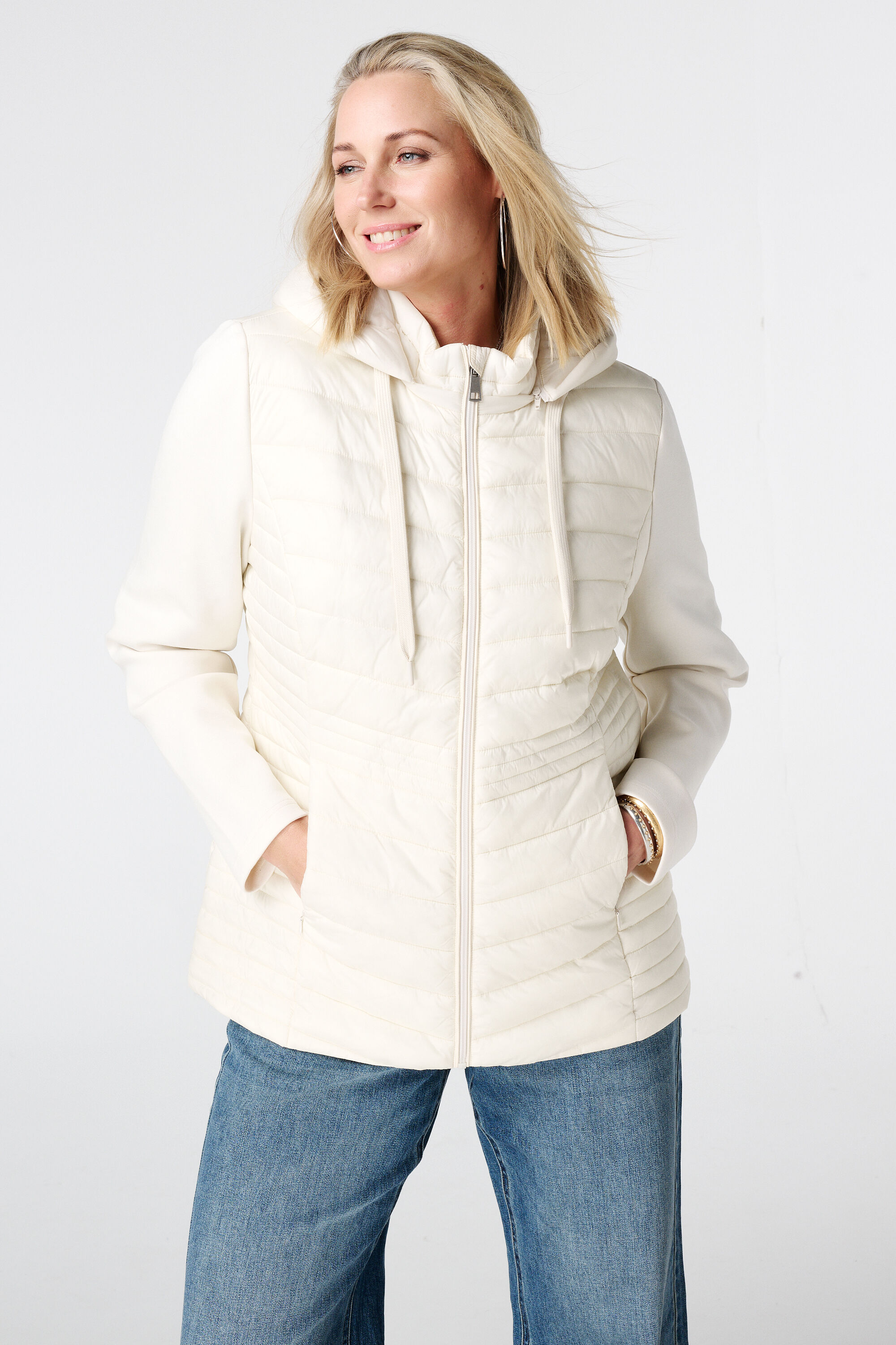 Veste matelass&eacute;e avec manches en tissu