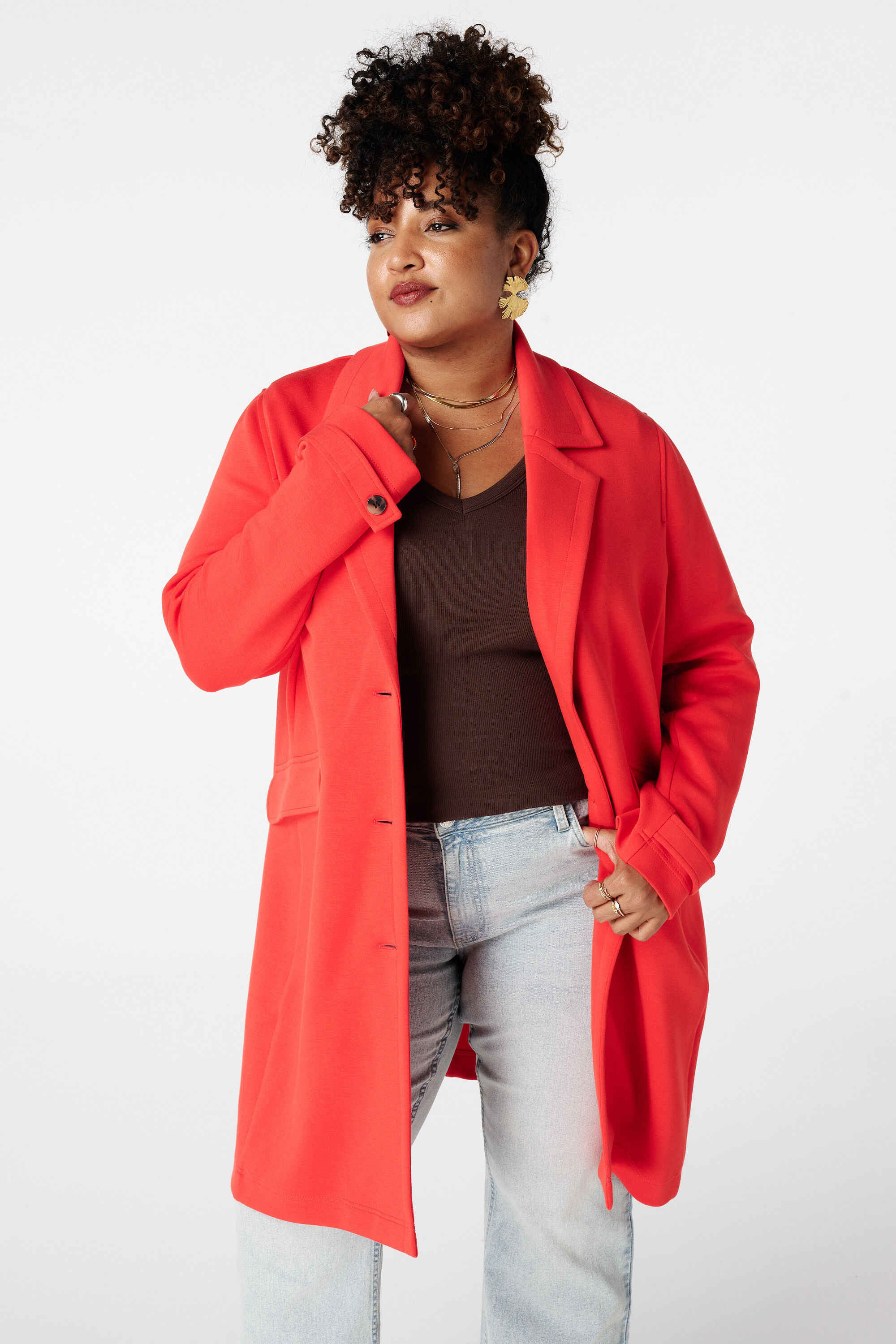 Manteljas met knoopsluiting