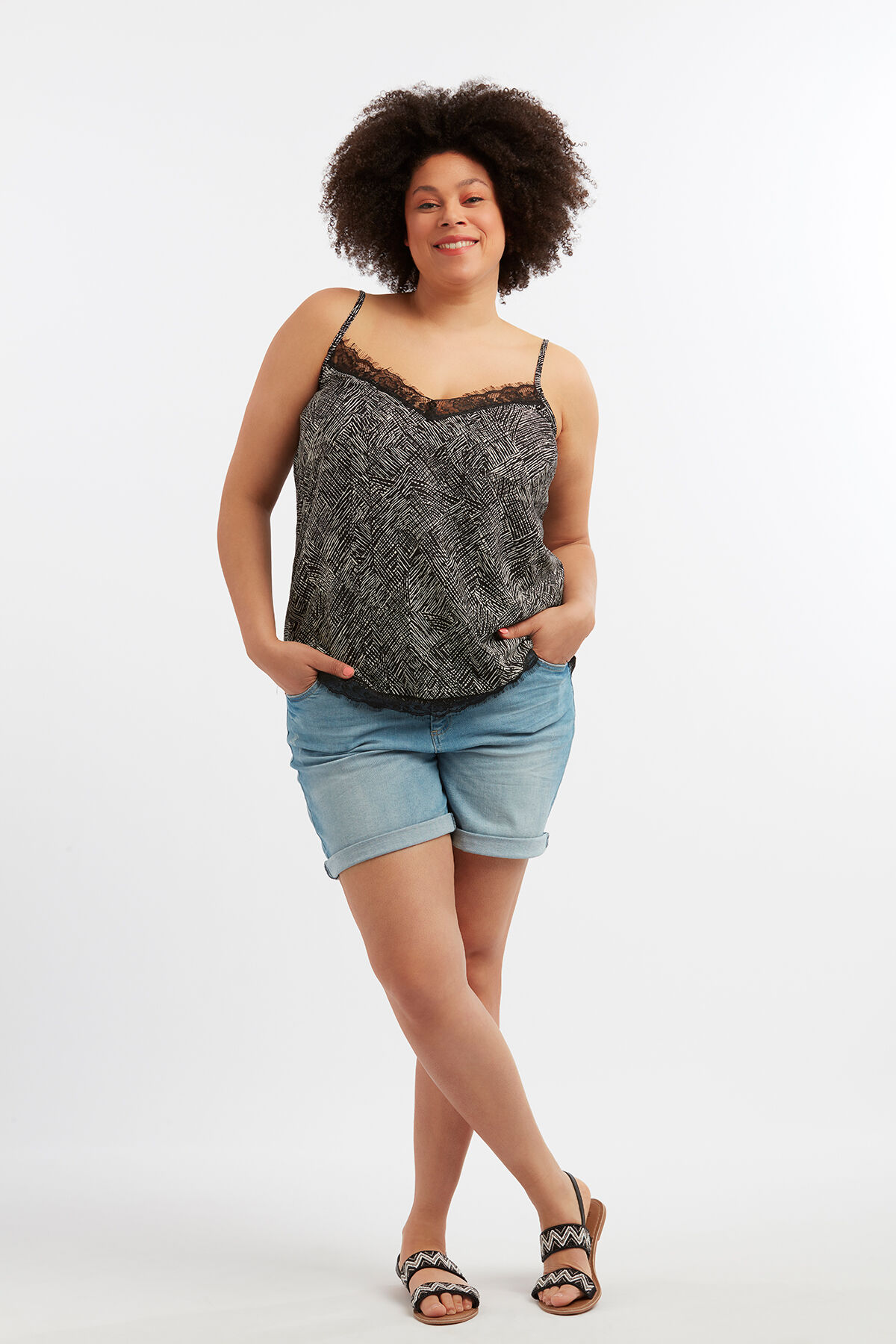 Mouwloze blouse met kanten detail image number 3