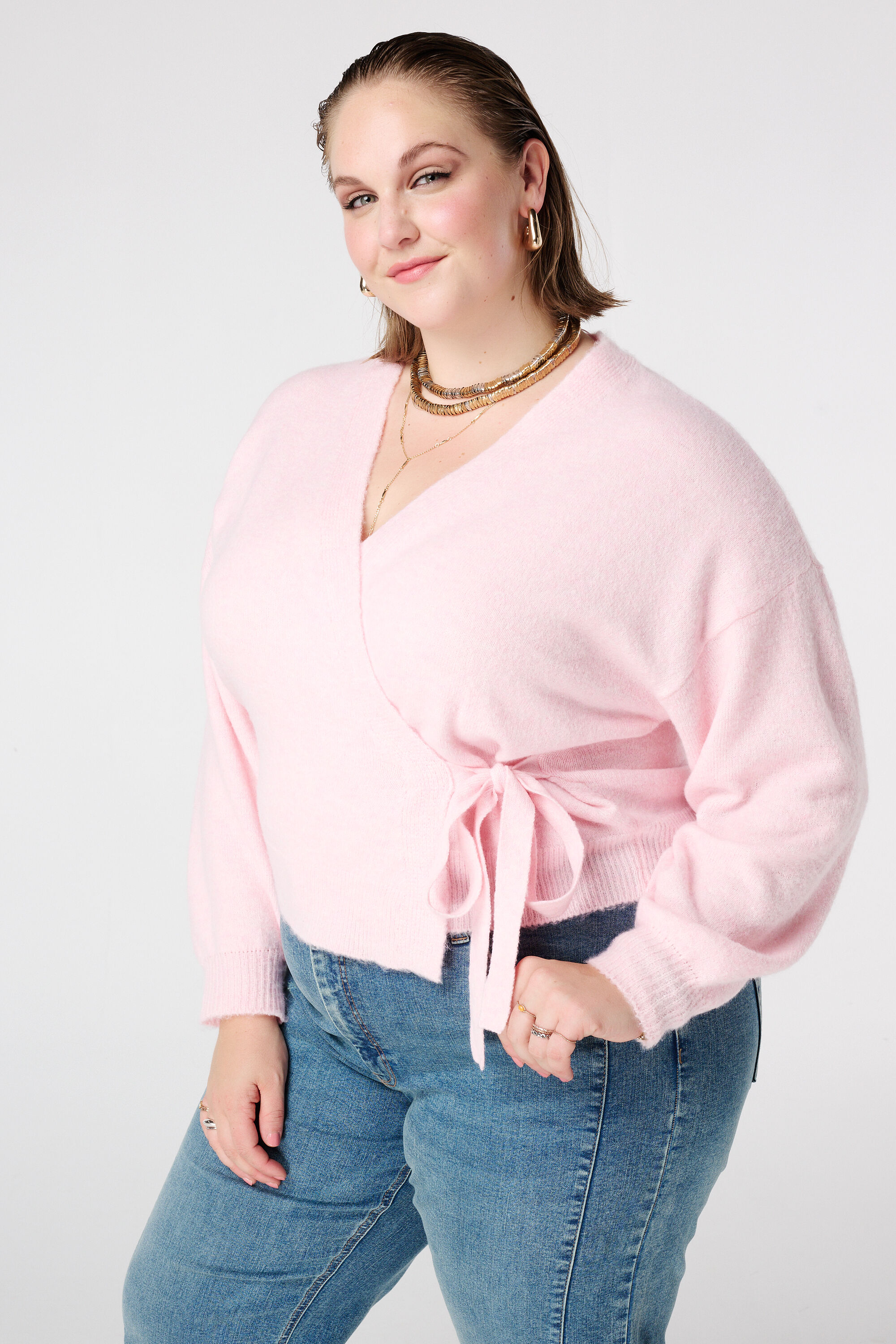 Overslag vest met strikceintuur