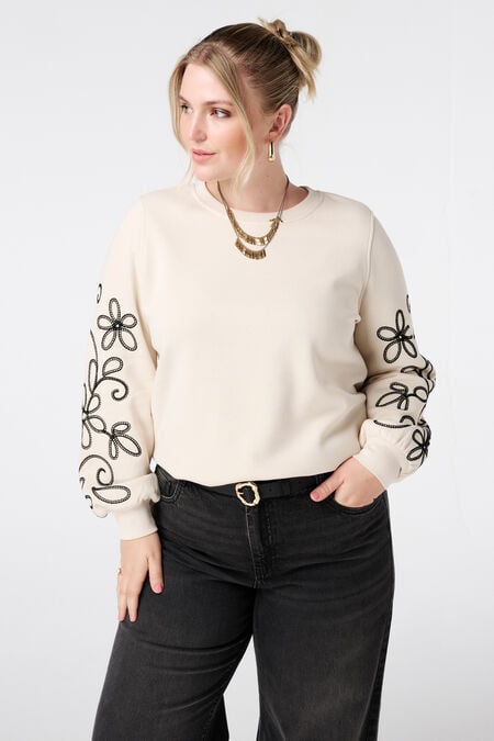 Sweater met broderie details Sweater met broderie details