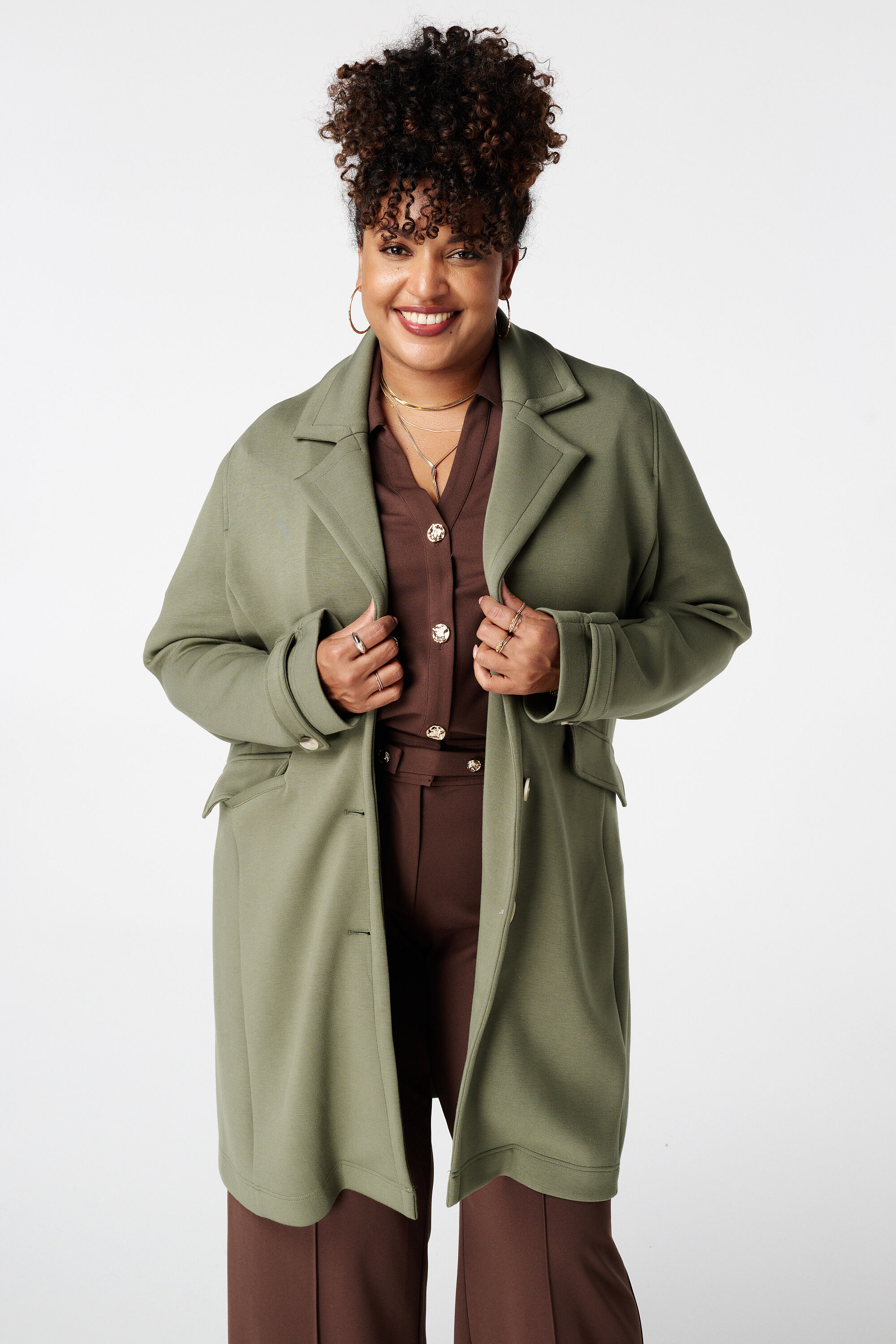 Manteljas met knoopsluiting