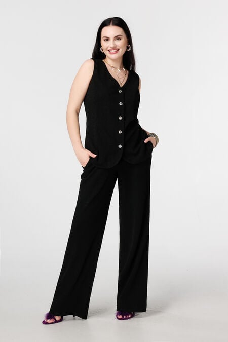 Pantalon avec lurex et taille élastique Pantalon avec lurex et taille élastique