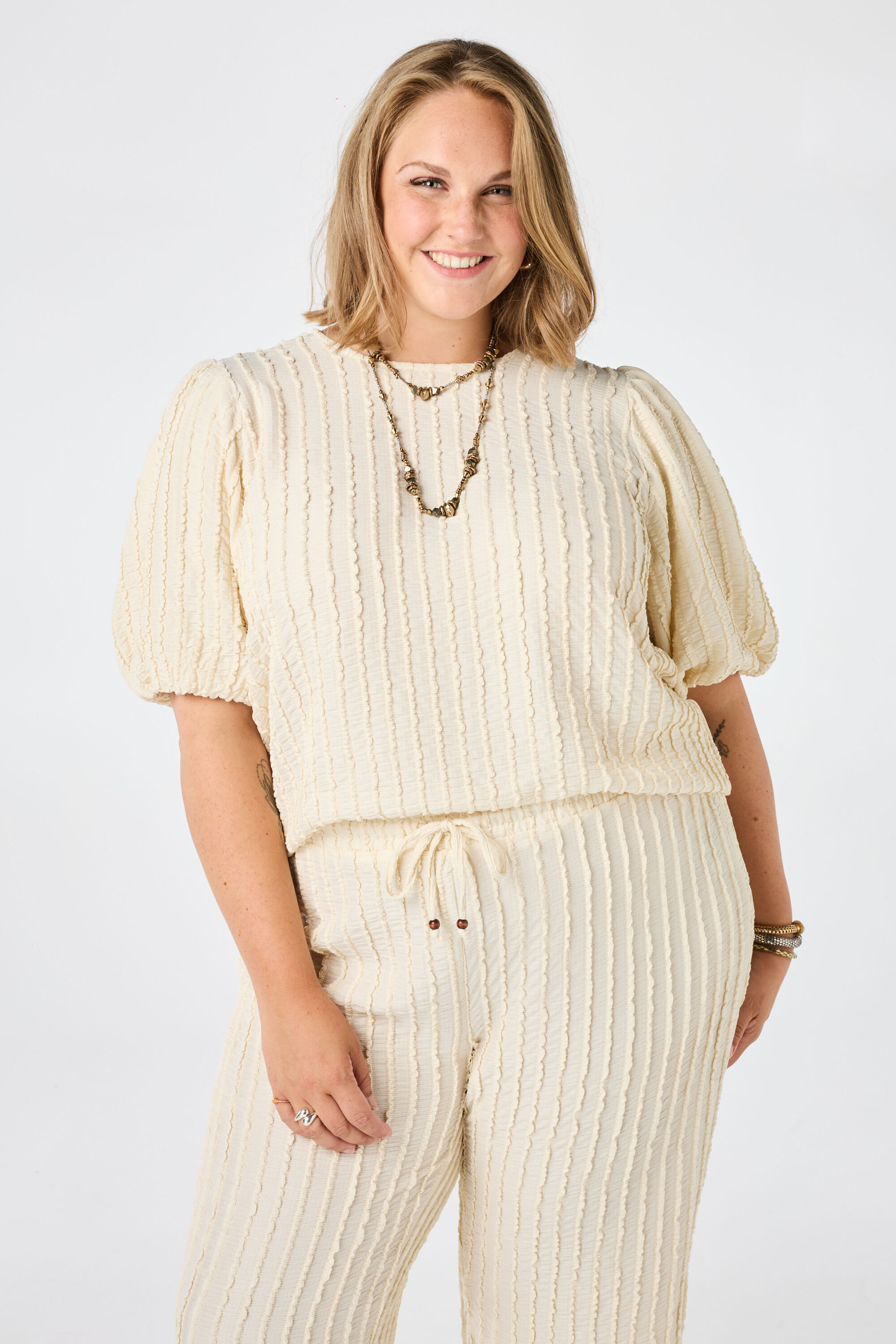 Crinkle top met pofmouwen
