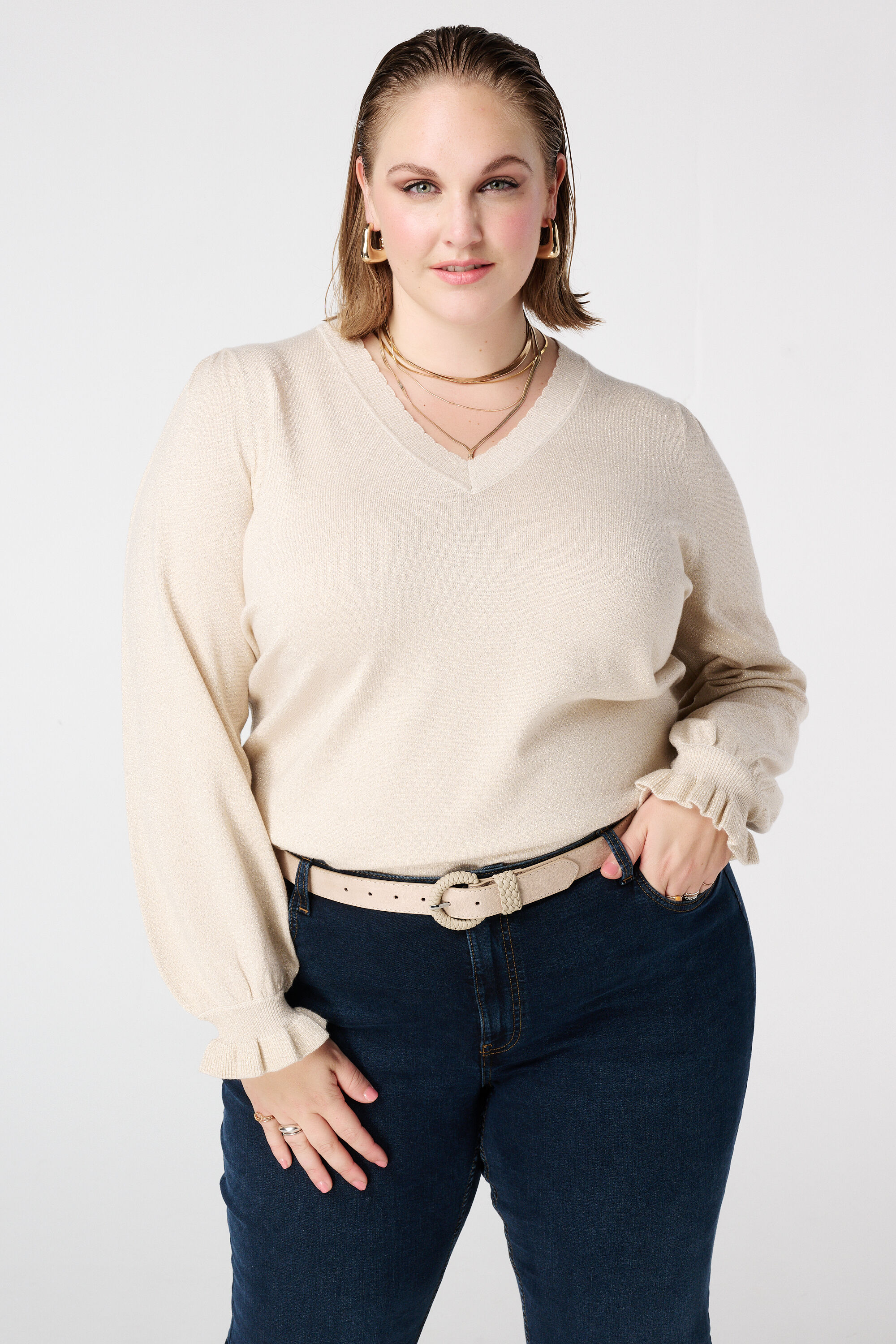 Lurex trui met ruffle mouw