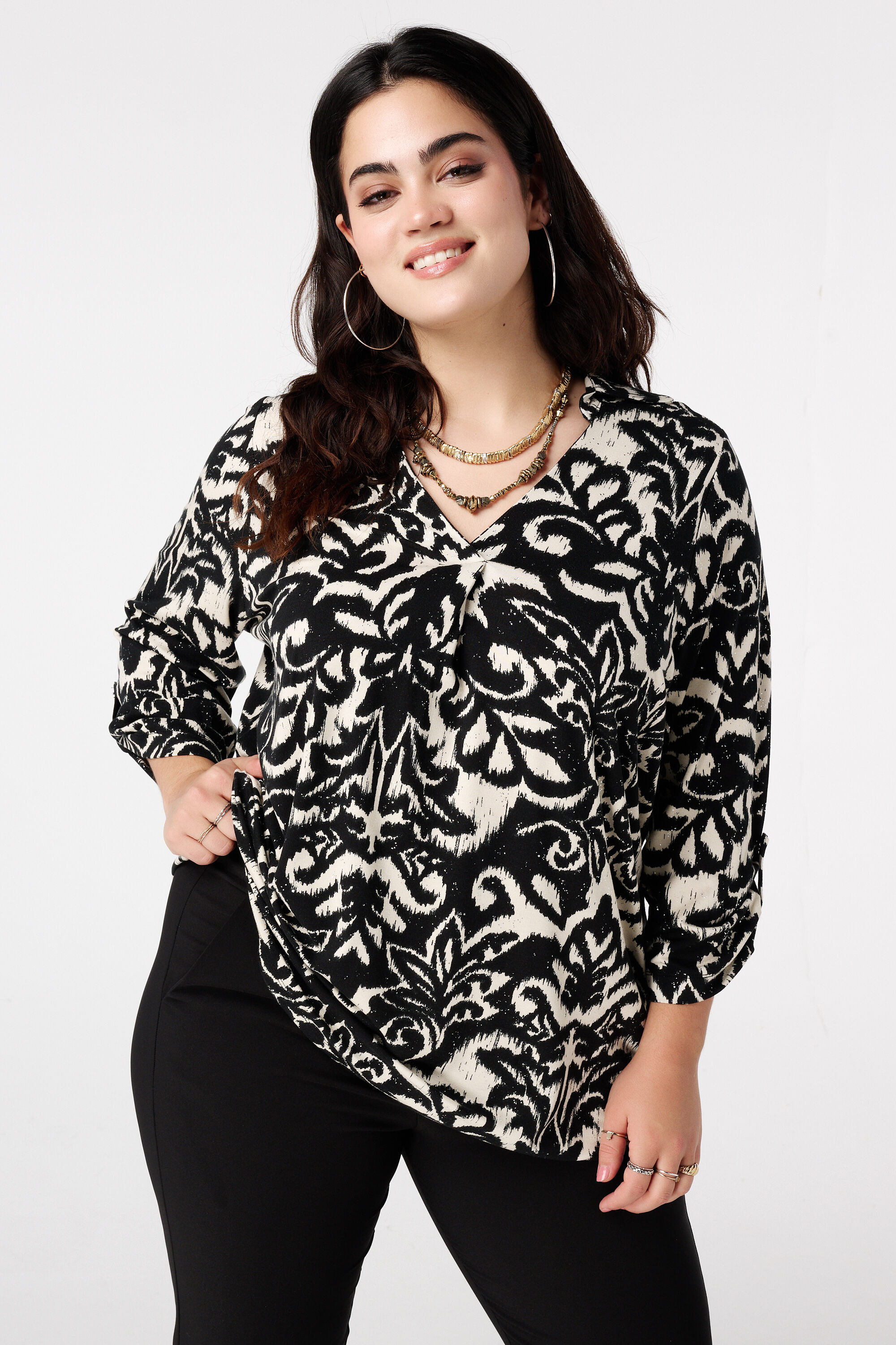 Top met stretch en foil print