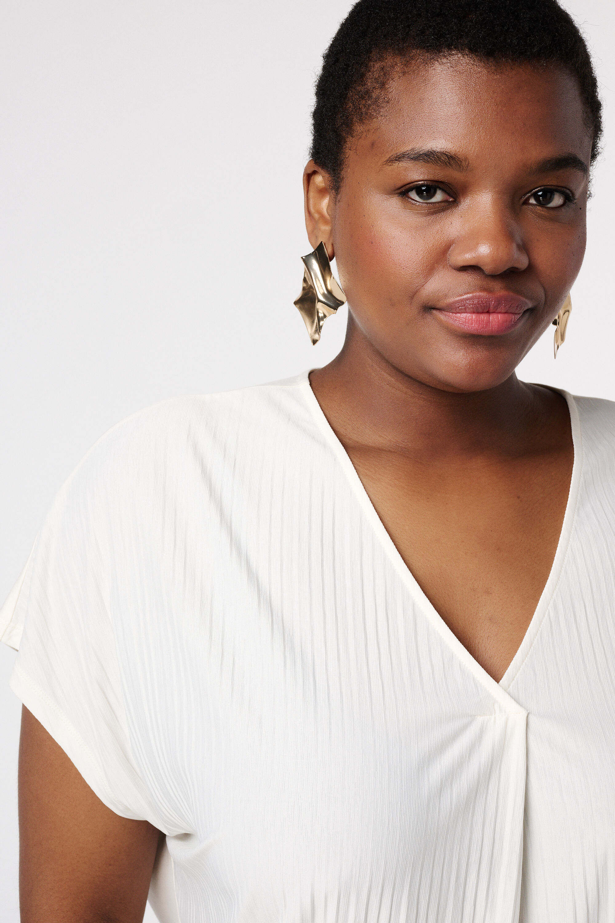 Top met structuur en V-hals image number 4