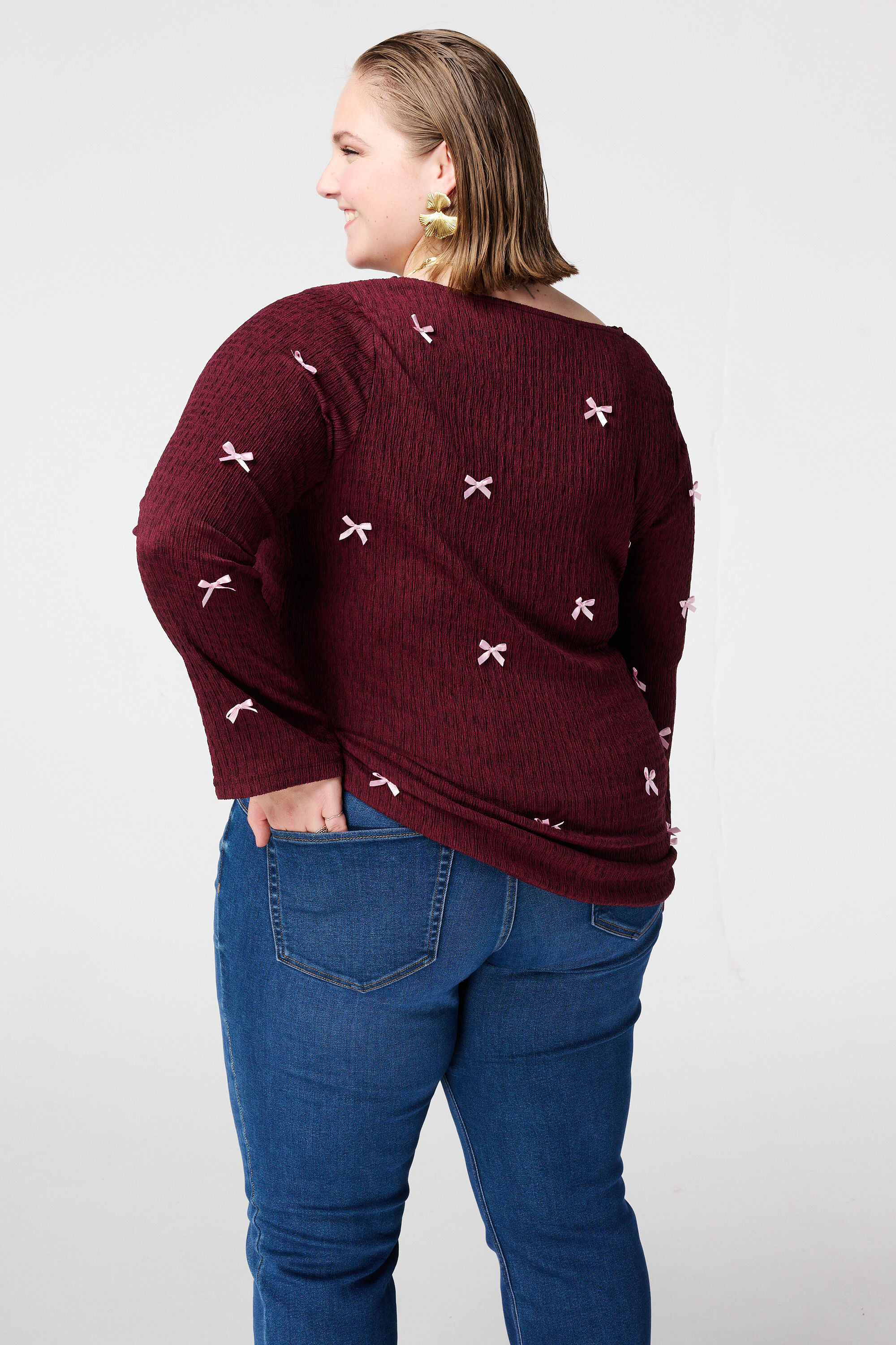 Top met strikdetails image number 3