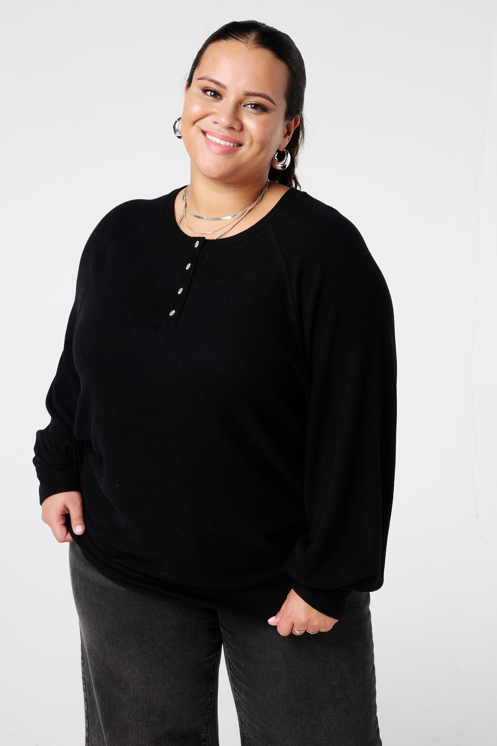 Velours trui met strass knopen